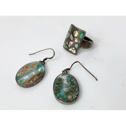 672 - A pair of silver and Opal earrings and matching ring.