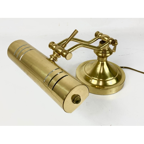 68 - A vintage brass adjustable desk lamp. 36cm.