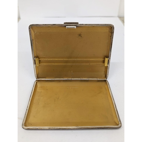 700 - An early 20th century silver cigarette case, 140 grams