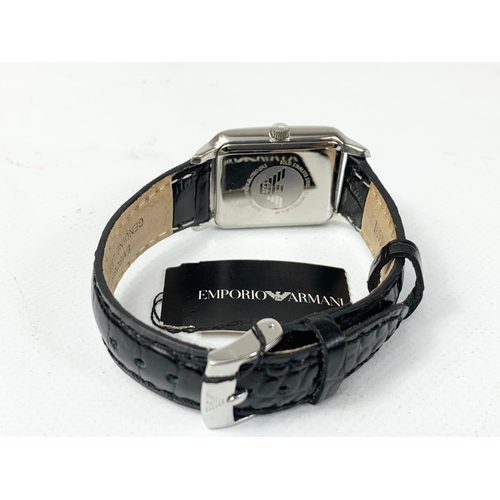 710 - A ladies Armani AR0413 watch.