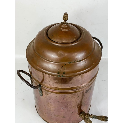 78 - A large early 20th century copper dispenser. 45 x 55cm.