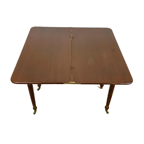 793 - A Regency mahogany tea table with rosewood cross banding, Nelson Twist legs, and quality reeded bras... 