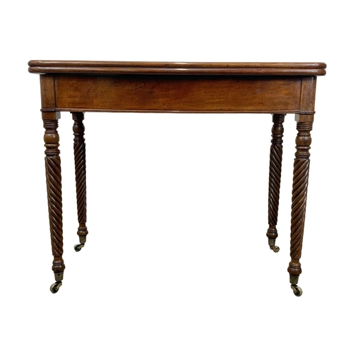 793 - A Regency mahogany tea table with rosewood cross banding, Nelson Twist legs, and quality reeded bras... 