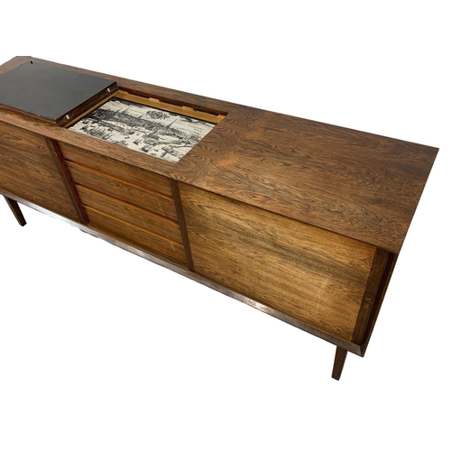 797 - A Danish rosewood sideboard by Hornslet Mobelfabrik with hot plate top. Mid Century. Circa 1960. 199... 