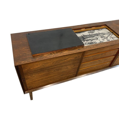 797 - A Danish rosewood sideboard by Hornslet Mobelfabrik with hot plate top. Mid Century. Circa 1960. 199... 