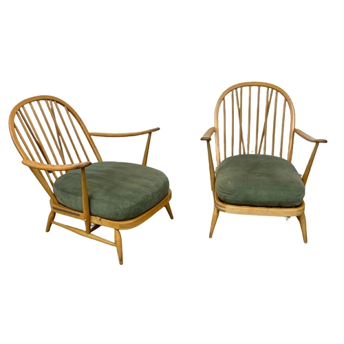 798 - A pair of Ercol Blonde elm Mid Century armchairs. Model 203.