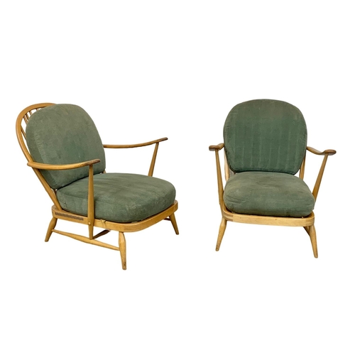 798 - A pair of Ercol Blonde elm Mid Century armchairs. Model 203.