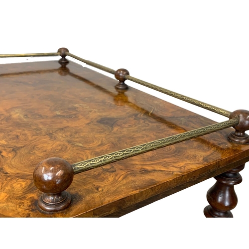 801 - A Victorian Burr Walnut Canterbury with brass gallery and drawer. Circa 1870. 60.5 x 40 x 91cm.