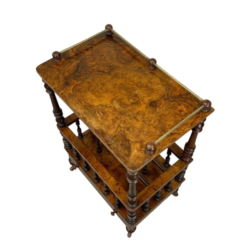 801 - A Victorian Burr Walnut Canterbury with brass gallery and drawer. Circa 1870. 60.5 x 40 x 91cm.