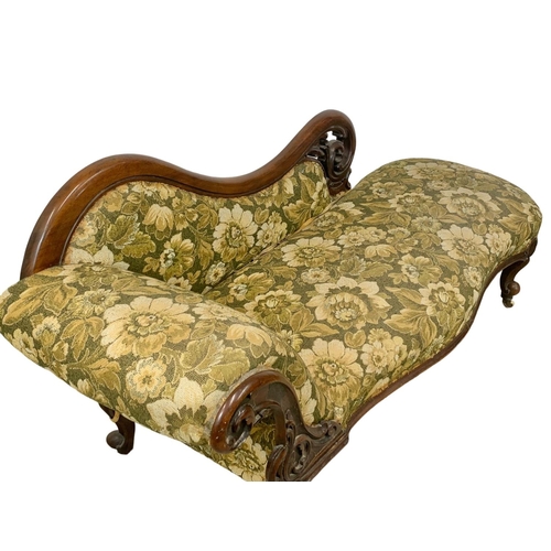 803 - A Victorian carved mahogany chaise lounge with Cabriole legs. Circa 1870. 199cm.