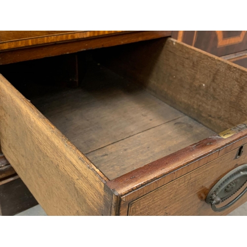 817 - A large late 18th century inlaid mahogany chest of drawers with inlaid panel door. In the Sheraton s... 