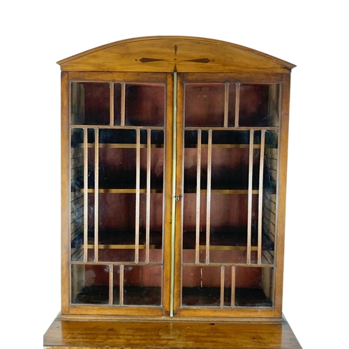 818 - A Georgian Regency period mahogany secretaire bookcase. Circa 1810-1820. 91.5 x 48.5 x 212cm.