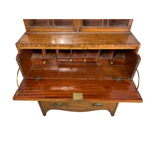 818 - A Georgian Regency period mahogany secretaire bookcase. Circa 1810-1820. 91.5 x 48.5 x 212cm.