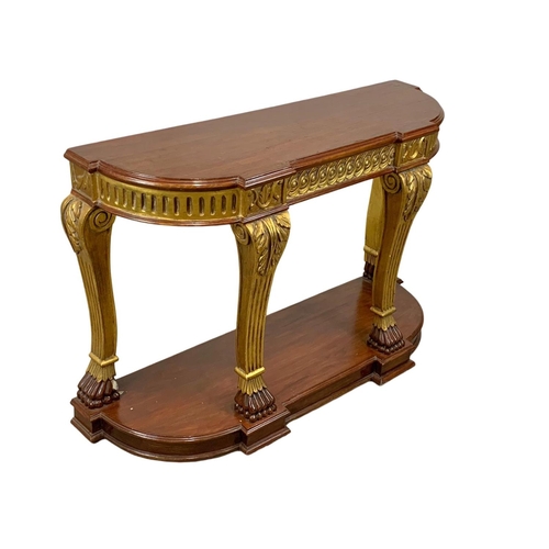 826 - A vintage Regency style gilt wood and mahogany console table. 135 x 43 x 84.5cm.