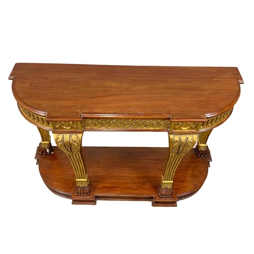 826 - A vintage Regency style gilt wood and mahogany console table. 135 x 43 x 84.5cm.