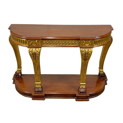 826 - A vintage Regency style gilt wood and mahogany console table. 135 x 43 x 84.5cm.