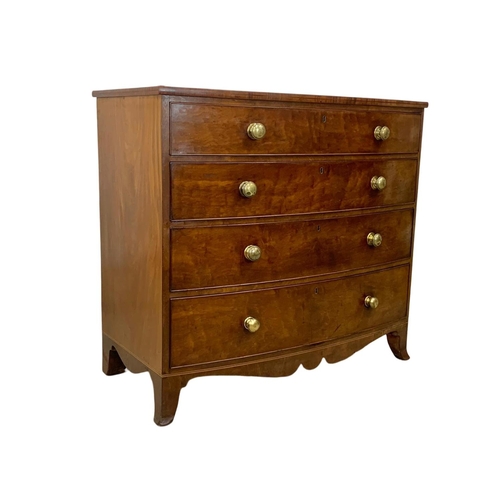 829 - A large Georgian mahogany bow front chest of drawers. Circa 1800-1820. 115.5 x 59 x 105cm.