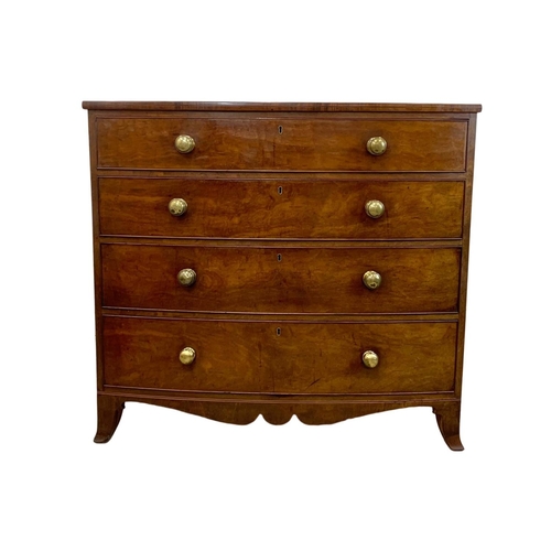 829 - A large Georgian mahogany bow front chest of drawers. Circa 1800-1820. 115.5 x 59 x 105cm.