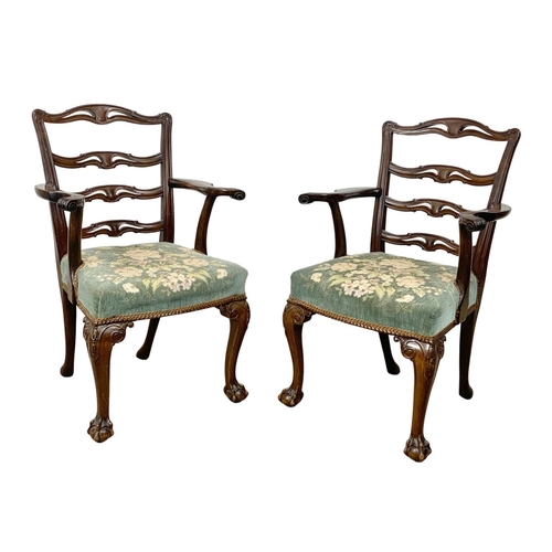 835 - A pair of early 20th century mahogany Chippendale style armchairs. Circa 1930.
1