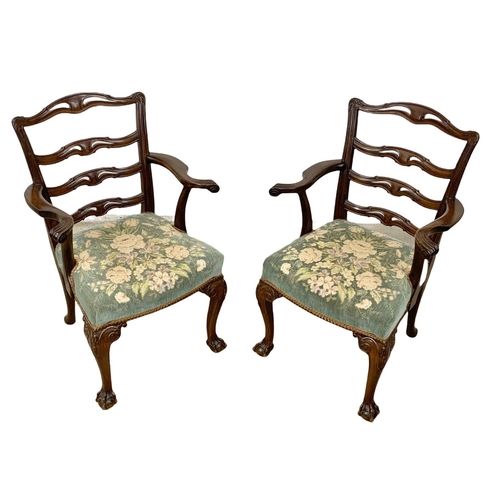 835 - A pair of early 20th century mahogany Chippendale style armchairs. Circa 1930.
1