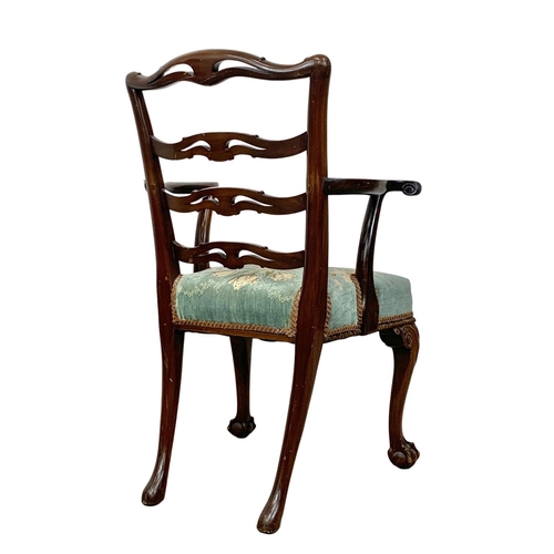 835 - A pair of early 20th century mahogany Chippendale style armchairs. Circa 1930.
1