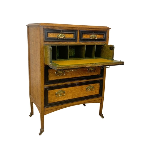 836 - A large early 20th century oak secretaire chest of drawers. Made by Wylie & Lochhead.  Circa 1920-19... 