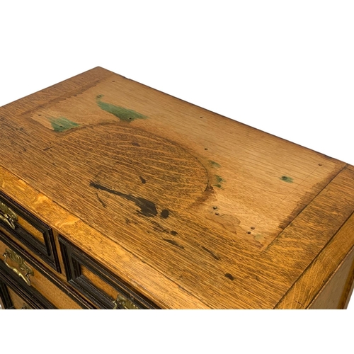 836 - A large early 20th century oak secretaire chest of drawers. Made by Wylie & Lochhead.  Circa 1920-19... 