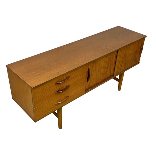 837 - A teak sideboard by Avalon. Mid Century. Circa 1960. 163 x 43.5 x 71cm.