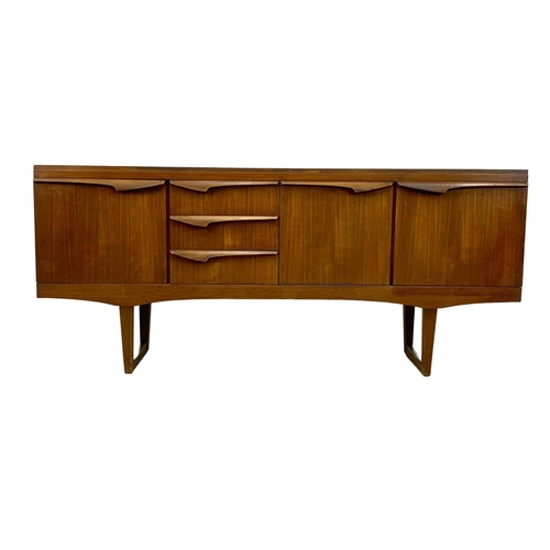 844 - A teak sideboard by Stonehill. Mid Century. 1960. 165 x 44.5 x 72.5cm.