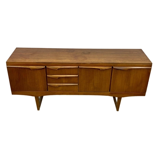 844 - A teak sideboard by Stonehill. Mid Century. 1960. 165 x 44.5 x 72.5cm.