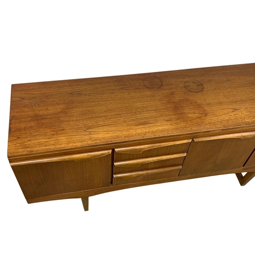 844 - A teak sideboard by Stonehill. Mid Century. 1960. 165 x 44.5 x 72.5cm.