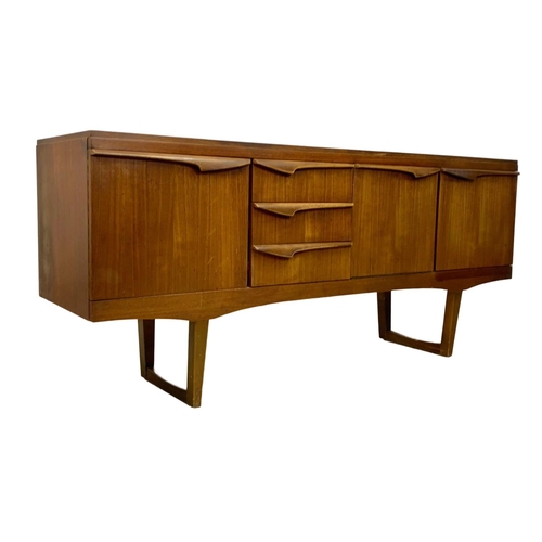 844 - A teak sideboard by Stonehill. Mid Century. 1960. 165 x 44.5 x 72.5cm.