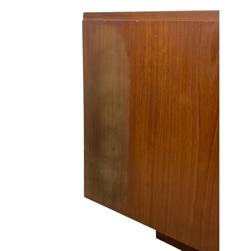 844 - A teak sideboard by Stonehill. Mid Century. 1960. 165 x 44.5 x 72.5cm.