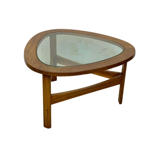 852 - A teak coffee table by Nathan Furniture with glass top. Mid Century. 1970. 73 x 72 x 43cm.