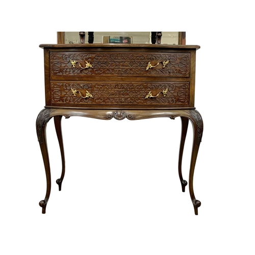 856 - A late Victorian mahogany display cabinet on chest. With Cabriole legs, open and closed Fretwork car... 