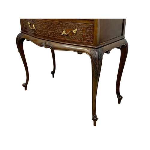 856 - A late Victorian mahogany display cabinet on chest. With Cabriole legs, open and closed Fretwork car... 