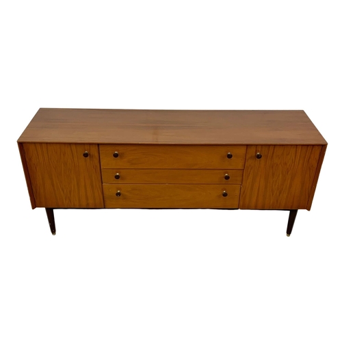 858 - A Mid Century sideboard. 1950-1960. 162.5 x 43 x 69.5cm