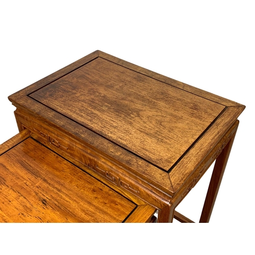 861 - A nest of 4 Chinese rosewood tables. Tallest 50.5 x 35.5 x 66cm.