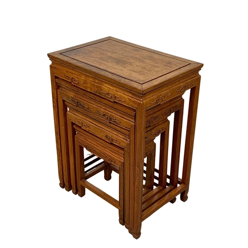 861 - A nest of 4 Chinese rosewood tables. Tallest 50.5 x 35.5 x 66cm.