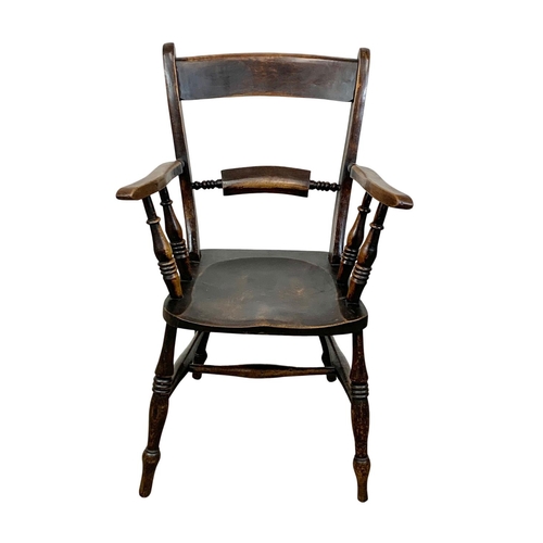 862 - A Victorian elm and beech Kitchen armchair