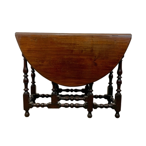 866 - An 18th century George II Spanish mahogany Gateleg drop leaf table with drawer. Circa 1730-1740. Ext... 