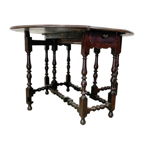 866 - An 18th century George II Spanish mahogany Gateleg drop leaf table with drawer. Circa 1730-1740. Ext... 