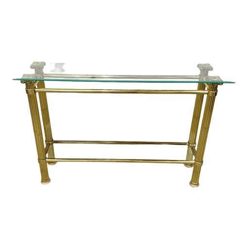 874 - A vintage Italian brass console table with 2 tier glass tops. 121 x 34 x 78cm