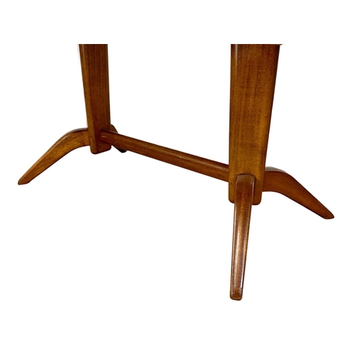 879 - A Mid Century Brazilian rosewood extending dining table by Gordon Russell. Circa 1960. Fully extende... 