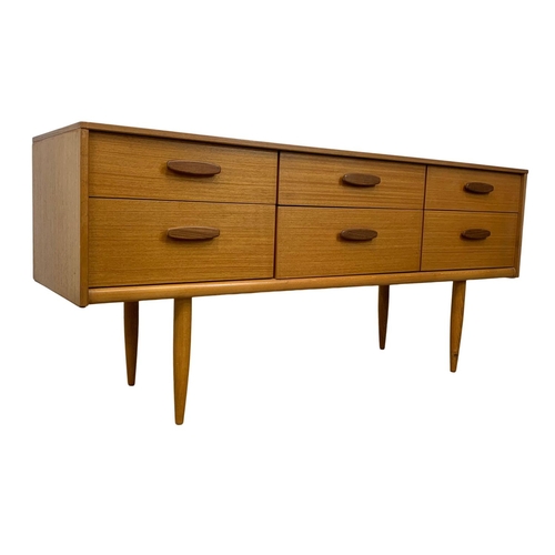 880 - A teak 6 drawer sideboard designed by Frank Guille for Austinsuite. Mid Century. 1960’s. 143.5 x 42 ... 