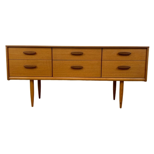 880 - A teak 6 drawer sideboard designed by Frank Guille for Austinsuite. Mid Century. 1960’s. 143.5 x 42 ... 