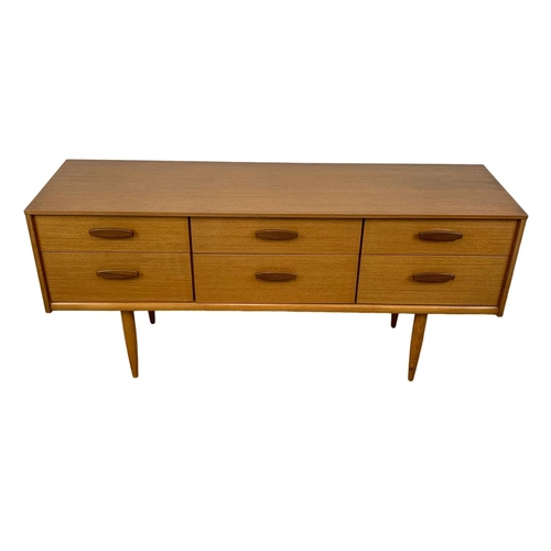 880 - A teak 6 drawer sideboard designed by Frank Guille for Austinsuite. Mid Century. 1960’s. 143.5 x 42 ... 