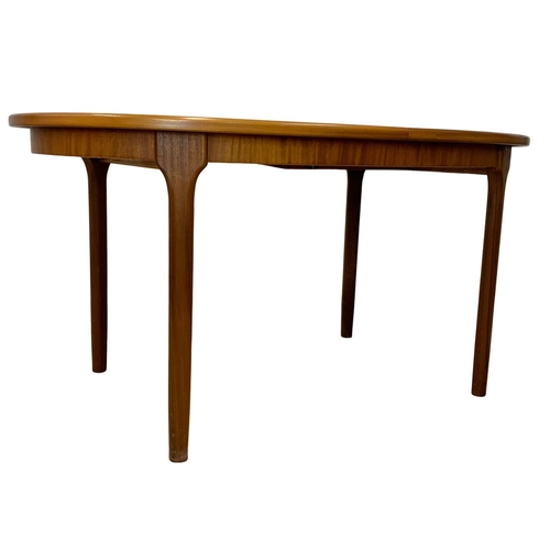 882 - A McIntosh teak extending dining table. Mid Century. Extended 197 x 95 x 76cm. Closed 152cm.