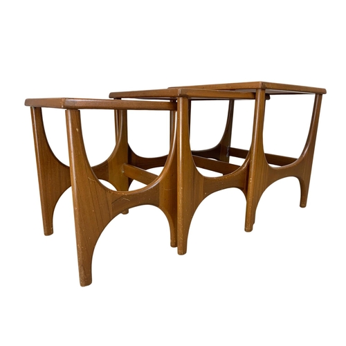 886 - A teak nest of tables by Stonehill. Mid Century