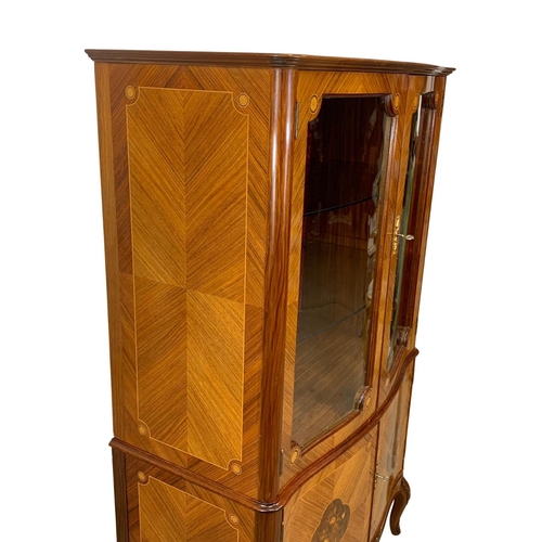 892 - An 18th century style French inlaid display cabinet. 93 x 47 x 152.5cm.